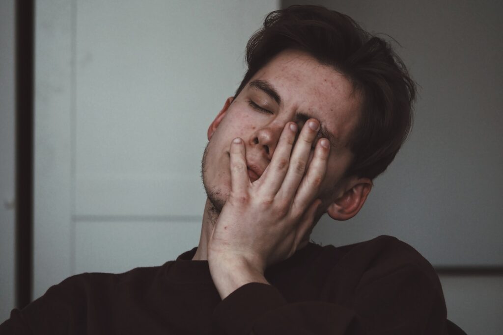man wearing black crew-neck top